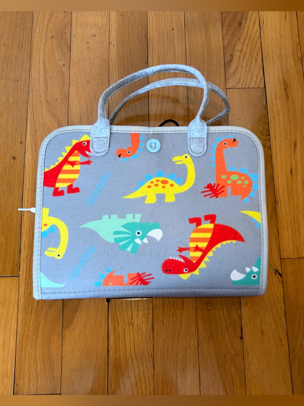 Kids Montessori Busy Board with Colorful Dinosaurs
